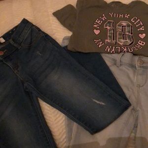 2 pair of girl jeans and 1 graphic tee